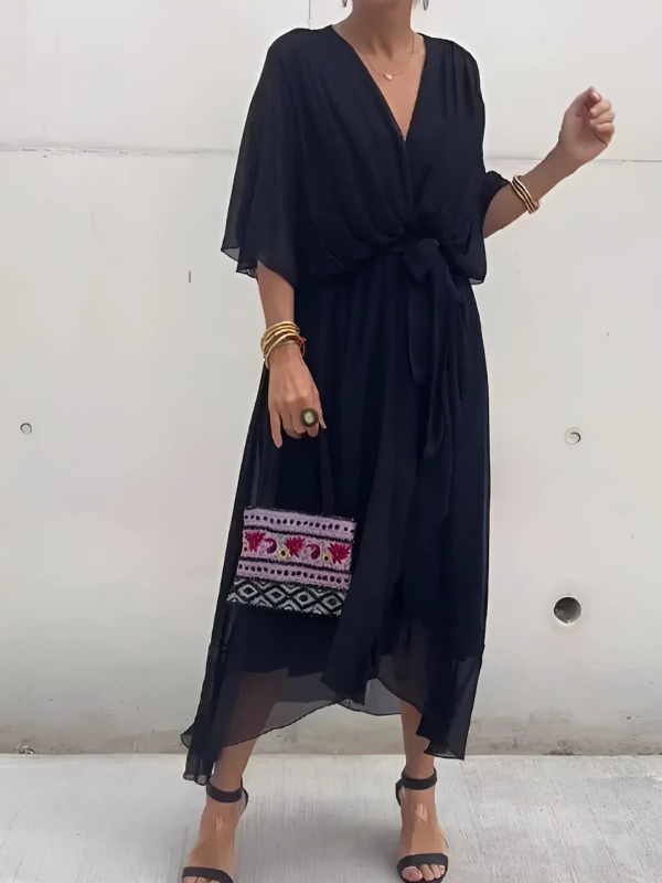 Abito lungo elegante da donna con cintura annodata in vita