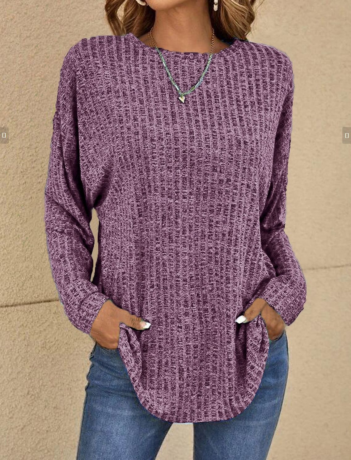 Women's Ribbed Sweater with Front Pockets and Curved Hem