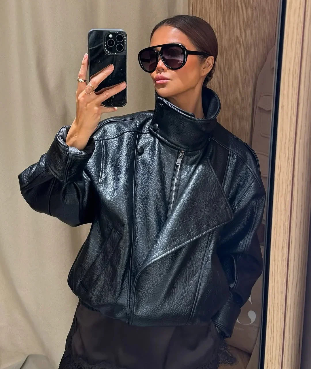 Daniela - Women's black faux leather jacket with stand-up collar | loose fit with zip - photo 1