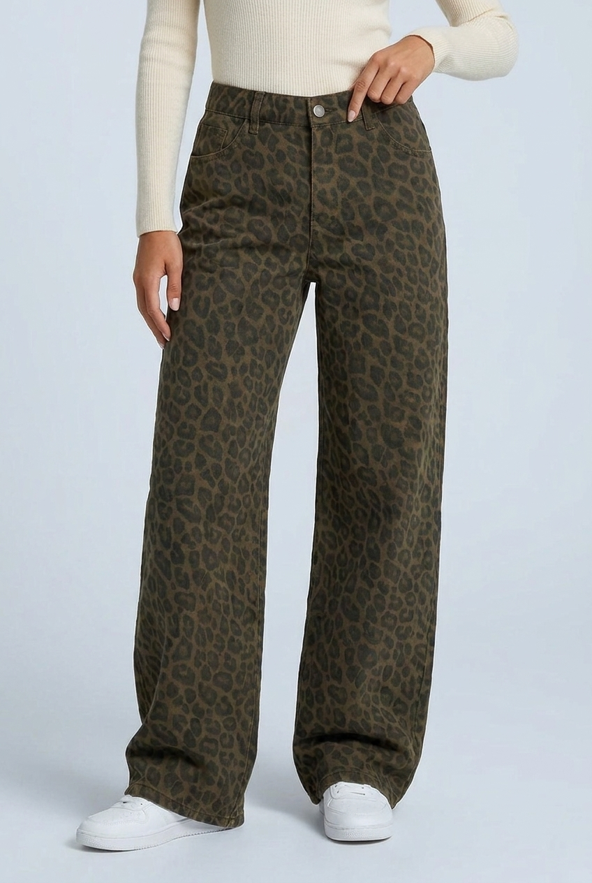 Detail of the high waist, belt loops and rivet-trimmed front pockets