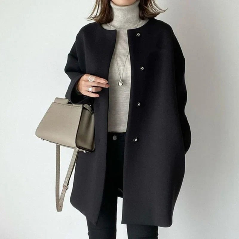 Xandra - women's coat with buttons and modern style - photo 1