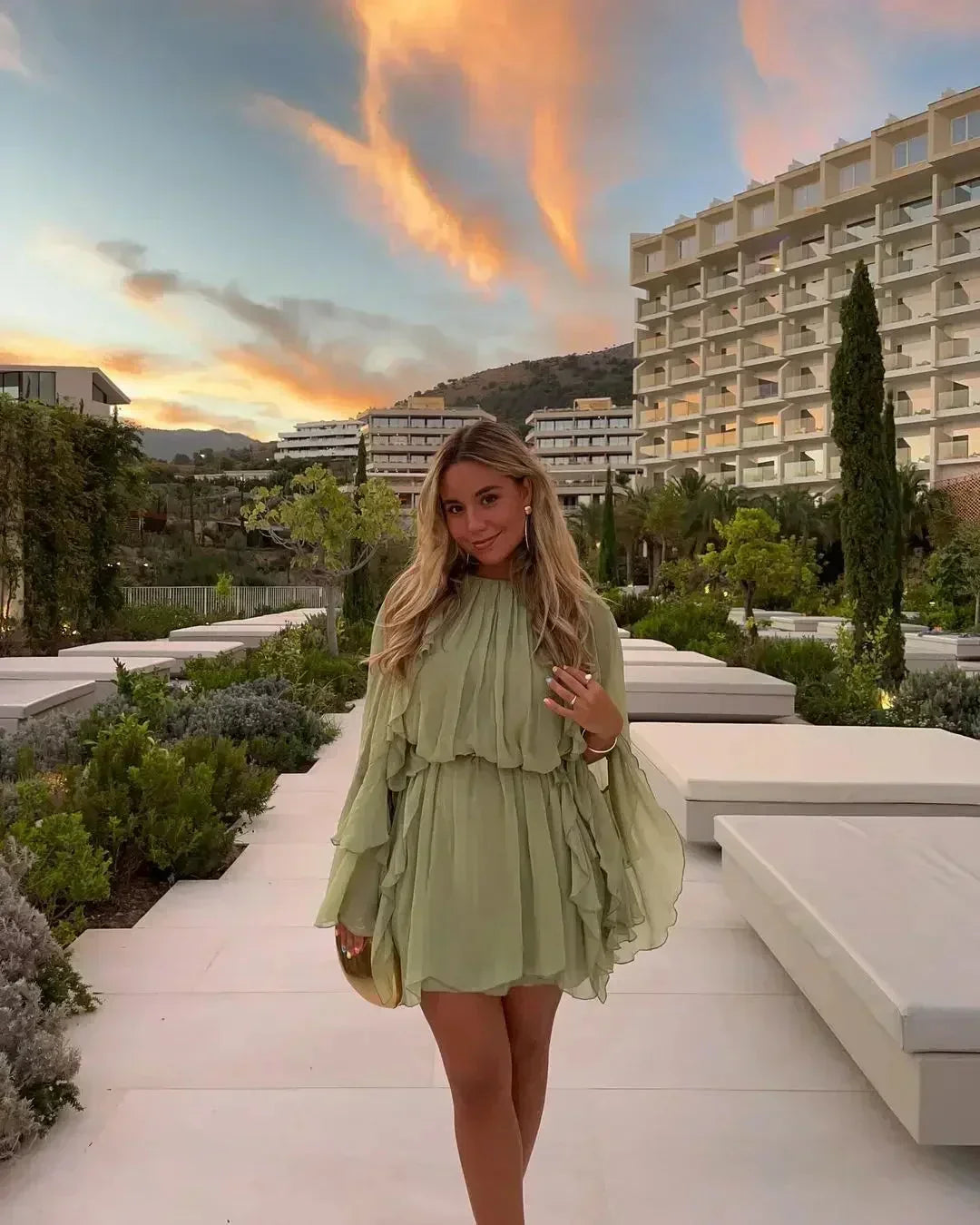 Naomi - Women's short light green ruffled evening dress with long sleeves - photo 7