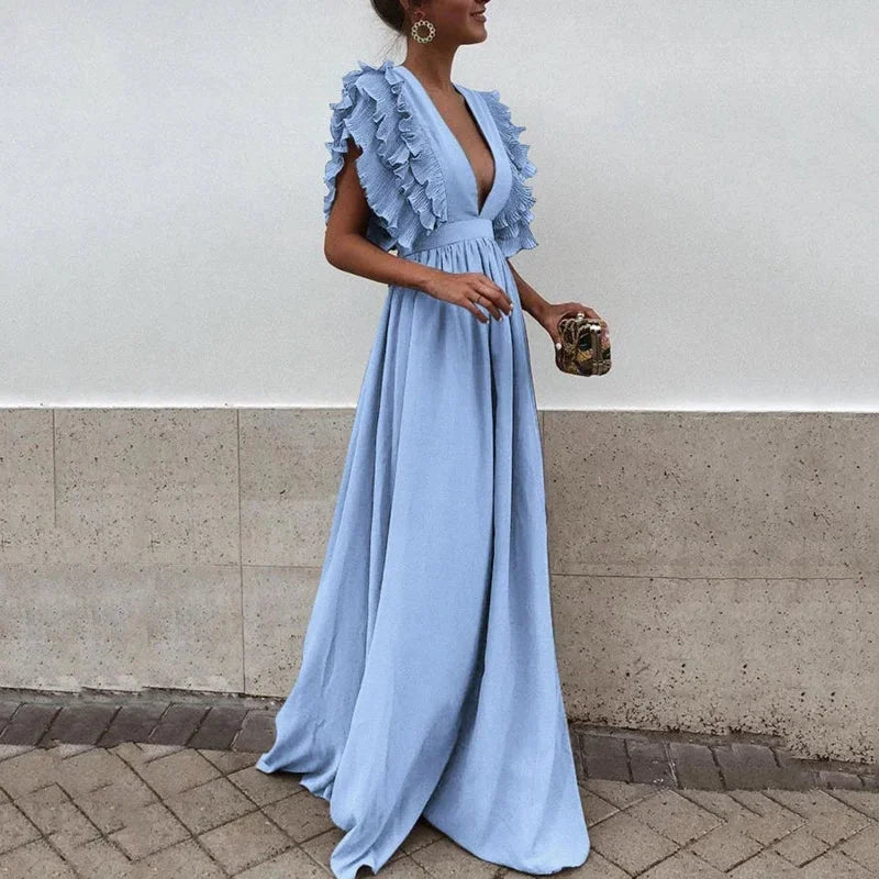 Nina - Women's long flowing dress with ruffled sleeves and a low neckline - photo 1