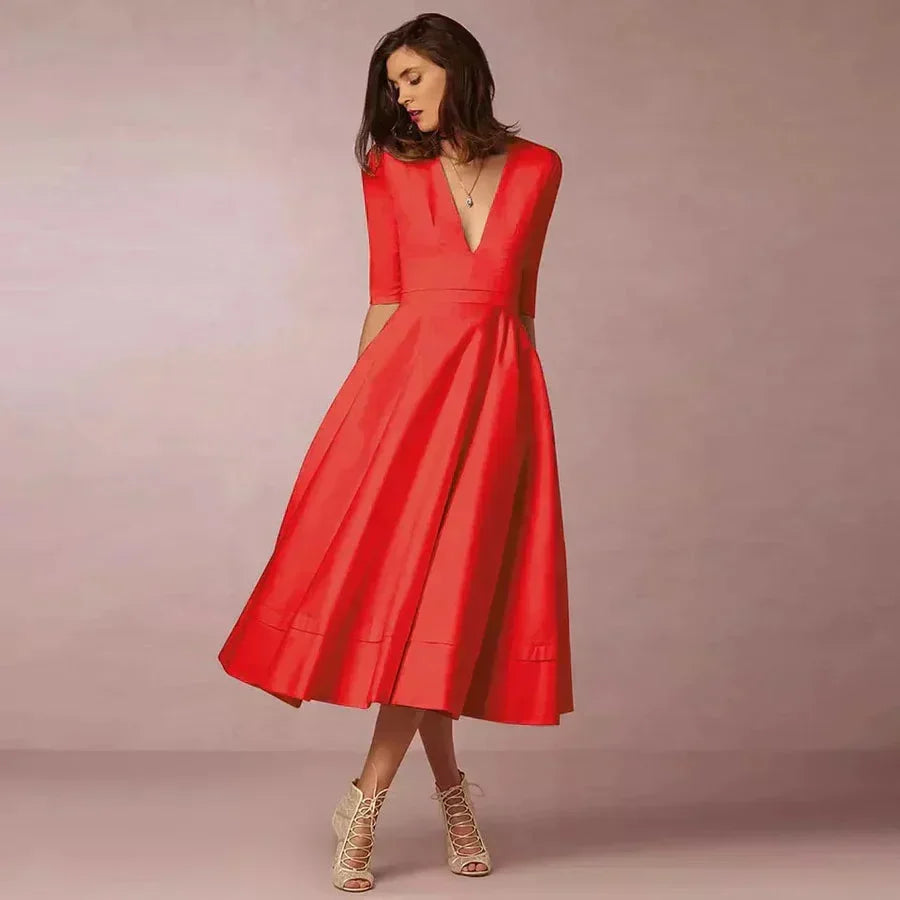 Daphne - Flared midi dress with V-neck, 3/4 sleeves and pockets - photo 2
