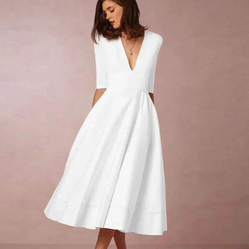 Daphne - Flared midi dress with V-neck, 3/4 sleeves and pockets - photo 4