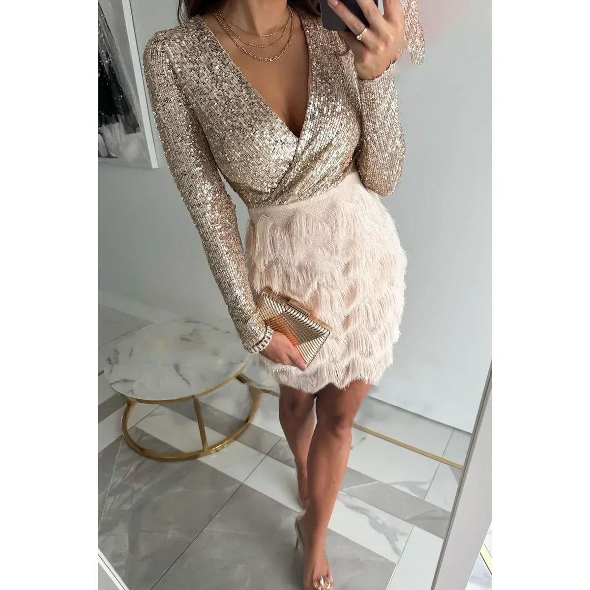 Noelle - Women's short dress with sequins, long sleeves, crossover skirt, and feathers - photo 1