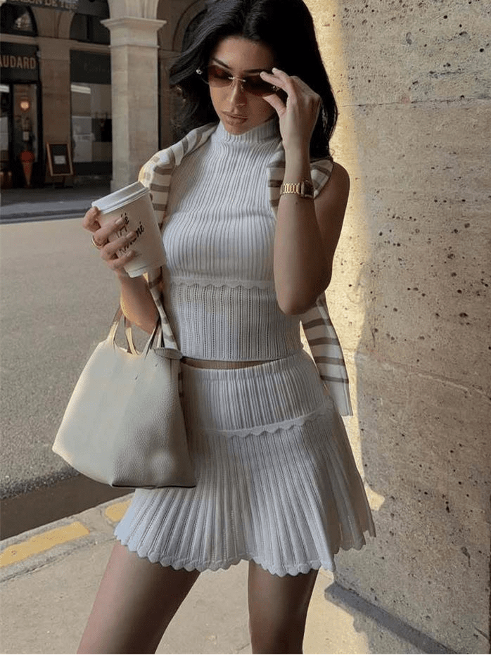 Amy - Completo coordinato da donna in maglia con minigonna plissettata