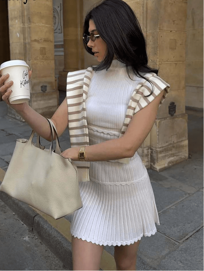Amy - Completo coordinato da donna in maglia con minigonna plissettata