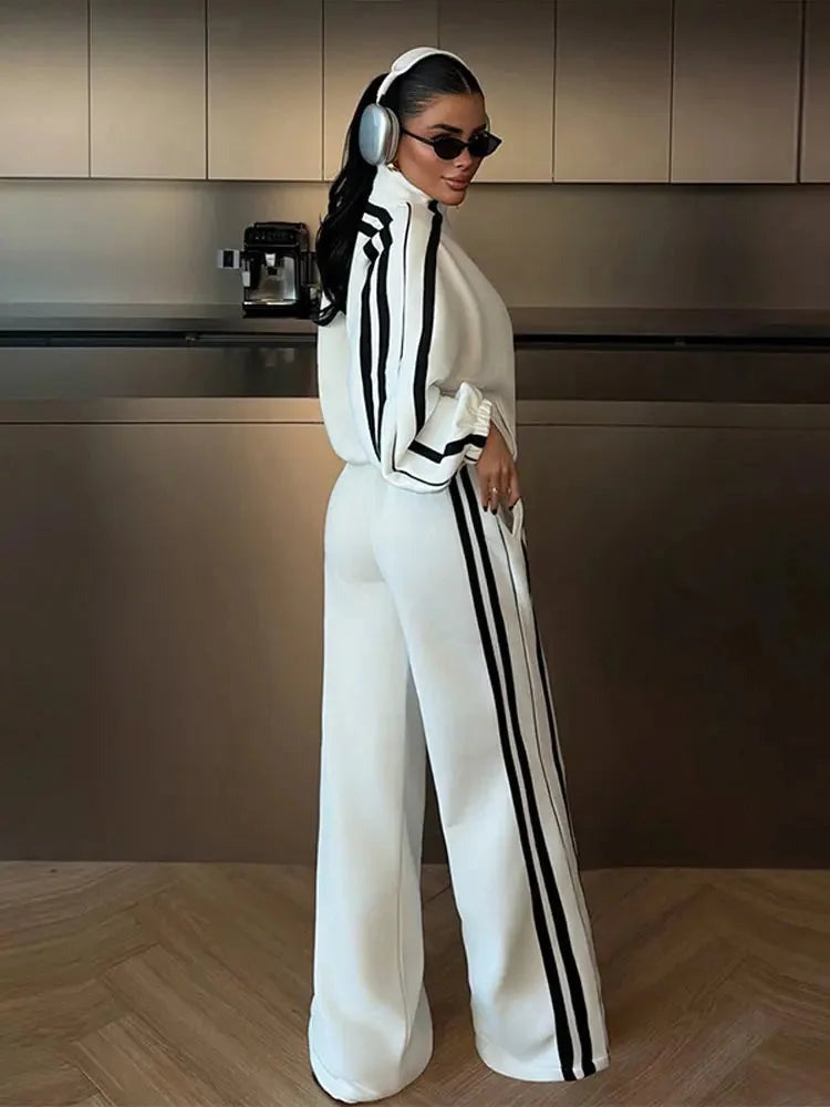 Kimberly - Women's sports outfit with zip-up jacket and wide-leg pants - photo 4