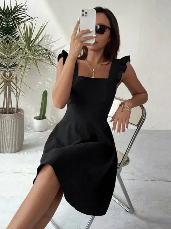 June - Women's short flared dress with summery flutter sleeves - photo 25