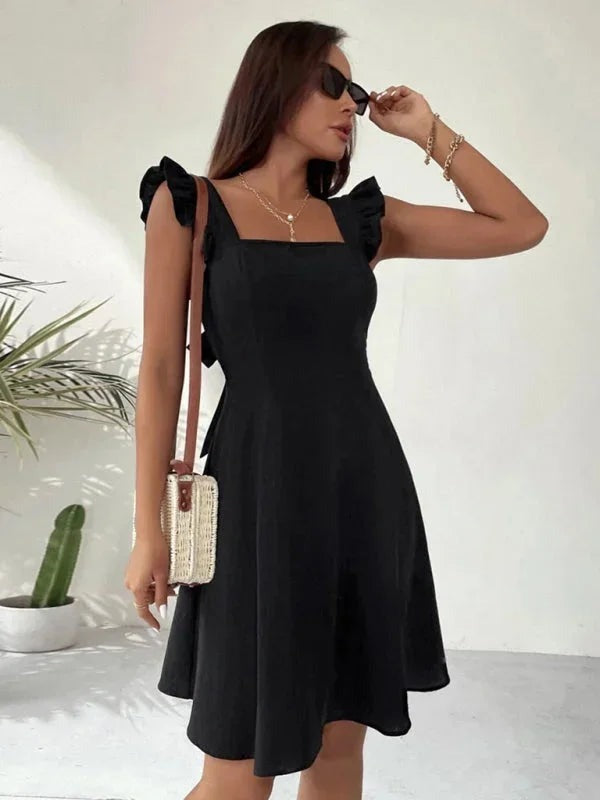June - Women's short flared dress with summery flutter sleeves - photo 26