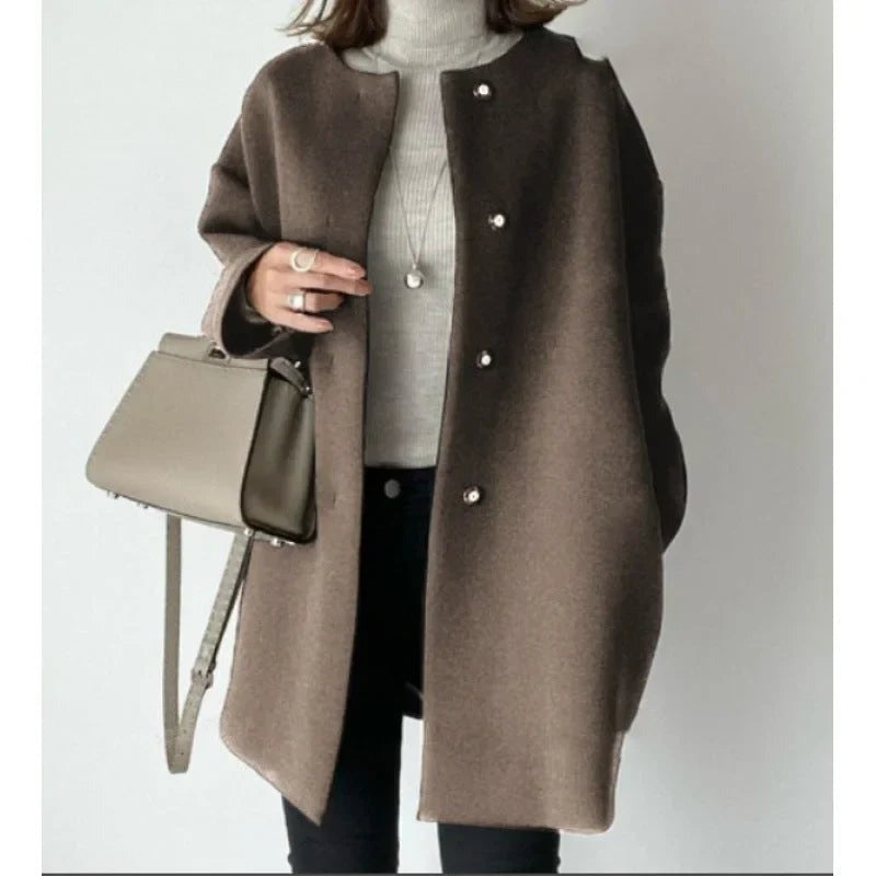 Xandra - women's coat with buttons and modern style - photo 2