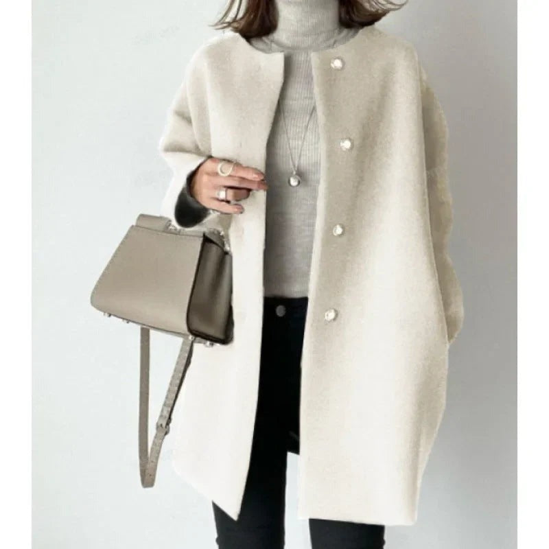 Xandra - women's coat with buttons and modern style - photo 3