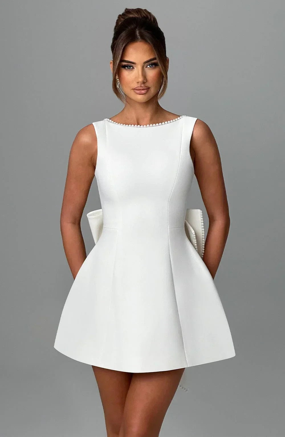 Georgia - Women's short dress with decorative bow at the back - photo 26
