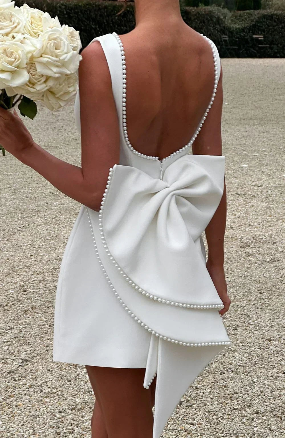 Georgia - Women's short dress with decorative bow at the back - photo 28