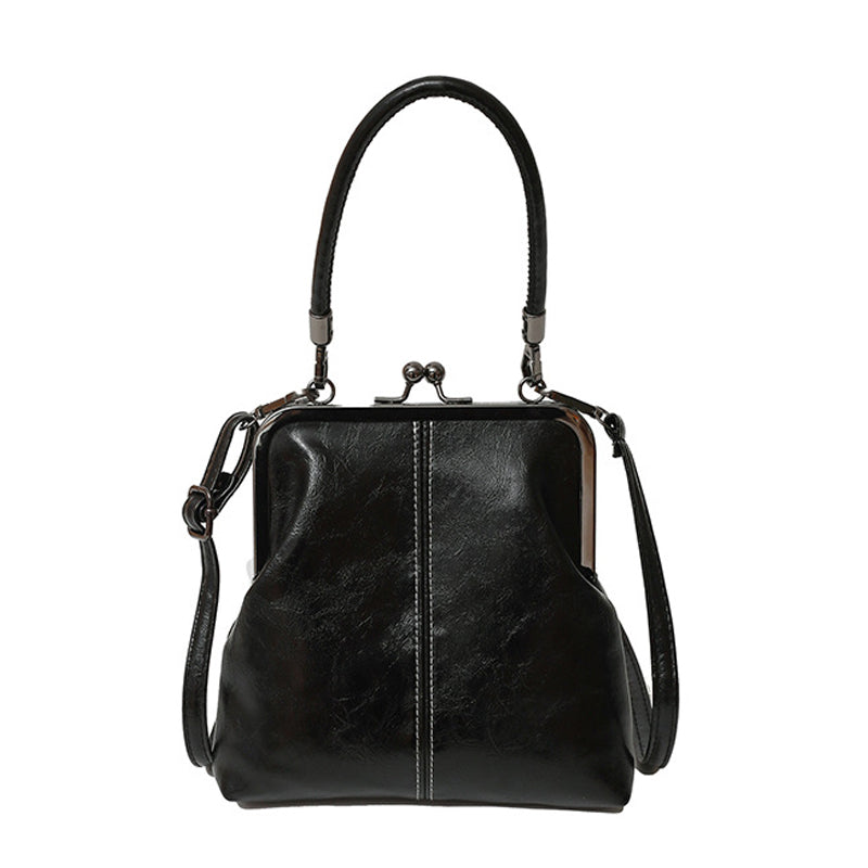 Women's Leather Kiss Lock Crossbody Bag with a Zip Closure